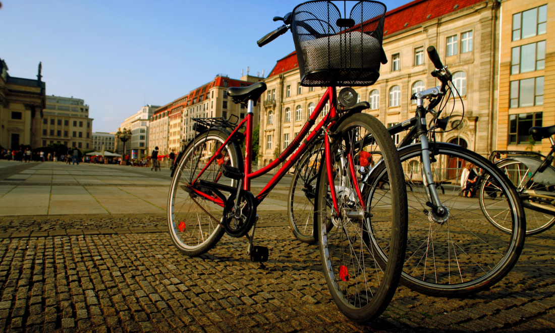 bikes parked on the pavement in berlin