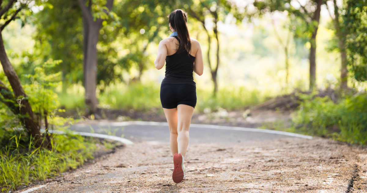 Woman Running in Park
