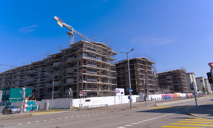 Which Swiss towns and cities are building the most houses?