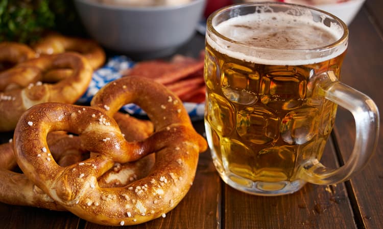 How do different Swiss cities celebrate Oktoberfest?