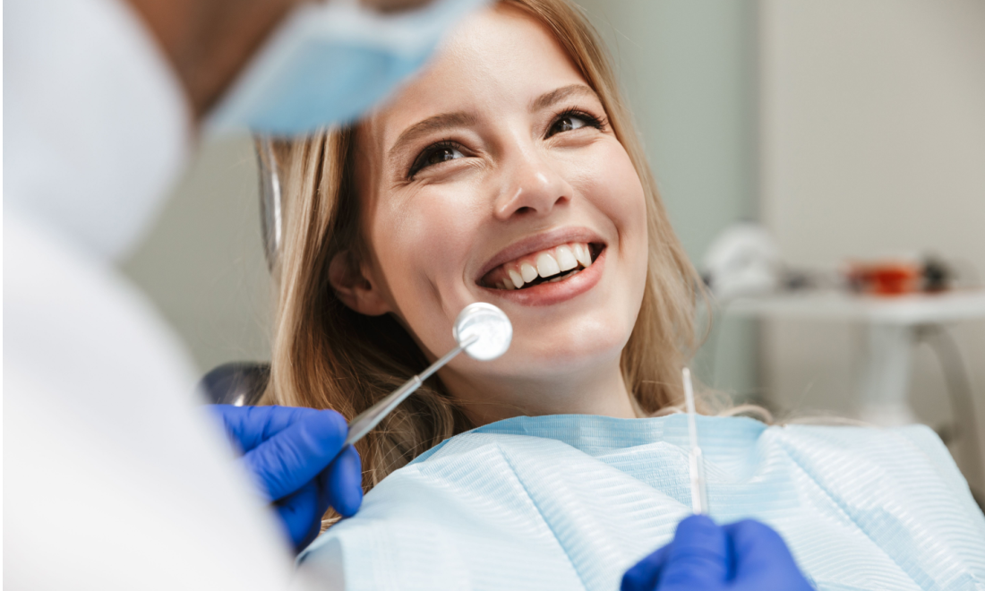 woman receiving dentist treatment