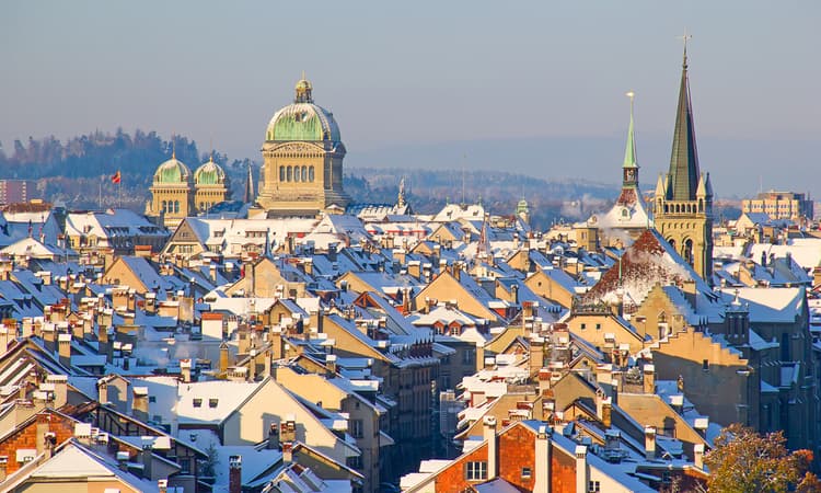 What are Swiss cities planning to do to save energy this winter?