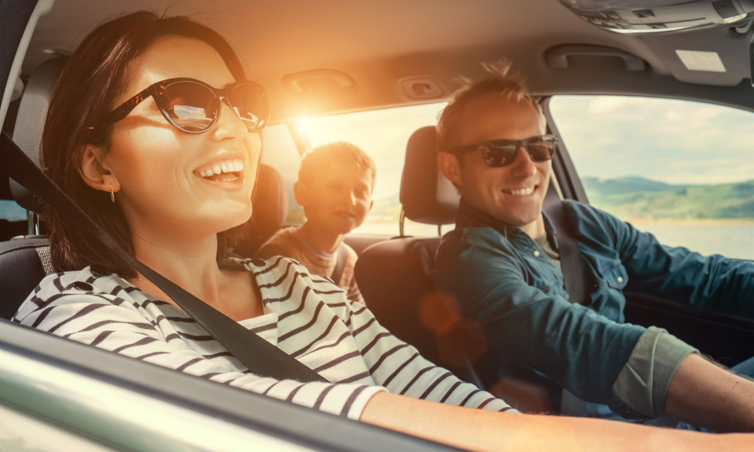 family driving in car