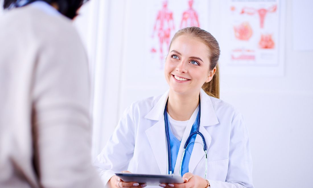 young doctor talking to patient