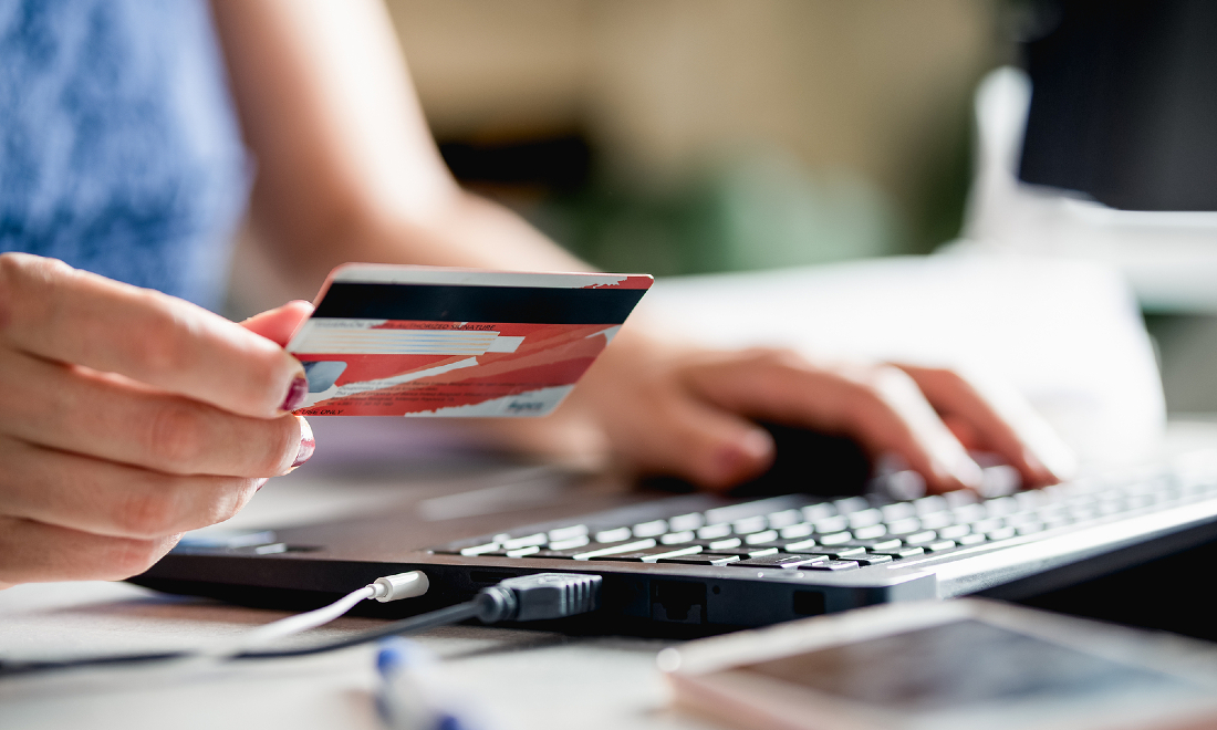 woman paying online with credit card