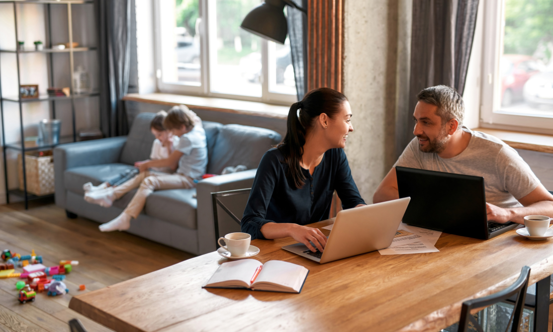 Couple working at home with kids