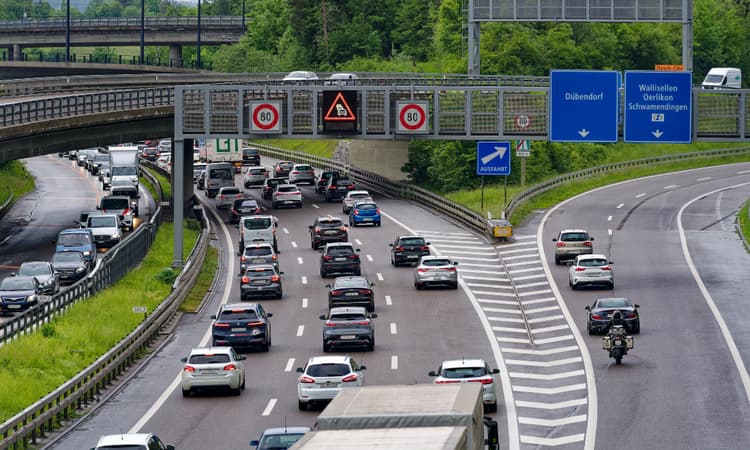 What causes traffic jams in Switzerland?