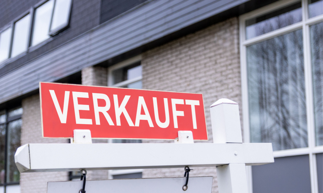 house sold sign in germany