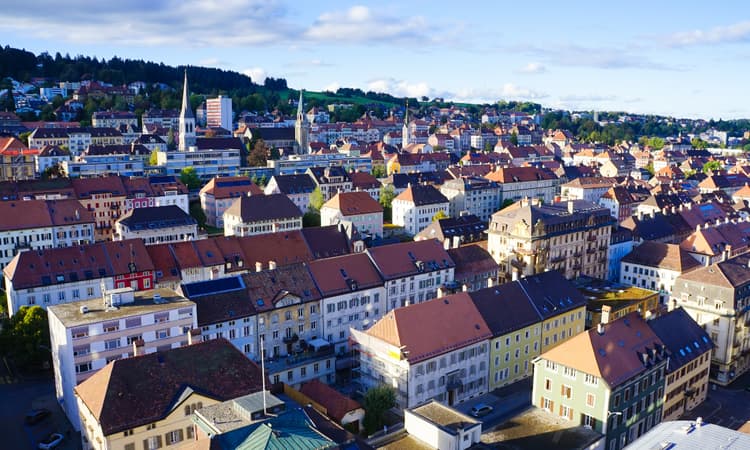 Why are rents in Switzerland expected to fall in 2025?