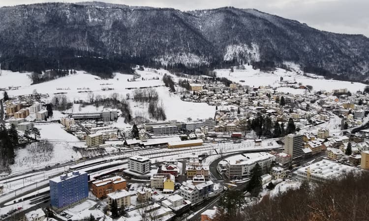 Why is a Swiss town trying to switch cantons?
