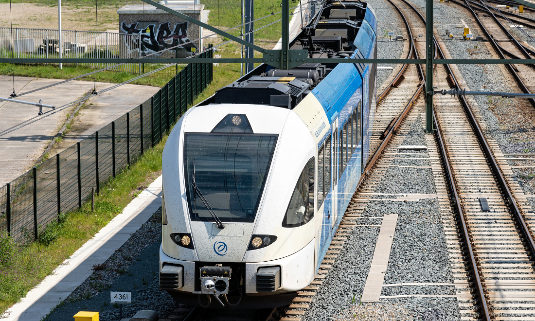 Arriva train running between Dutch cities