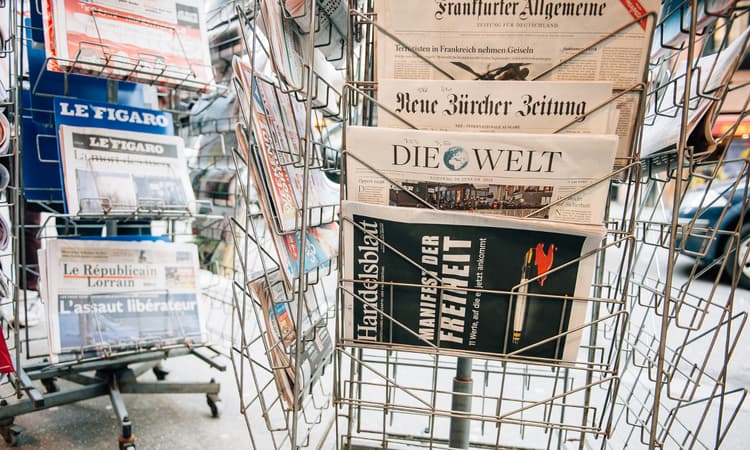 Russia threatens to sue Swiss newspaper over Putin caricature
