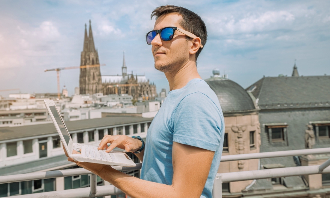 cozycozy man working on laptop in cologne