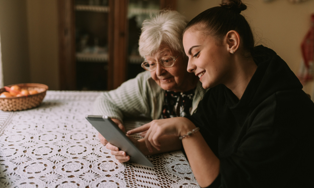 A grandmother and her granddaughter on the internet