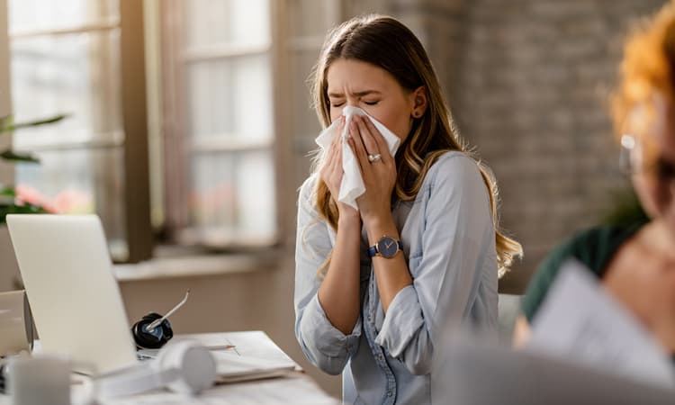 People working while sick costs Switzerland 5 billion francs a year