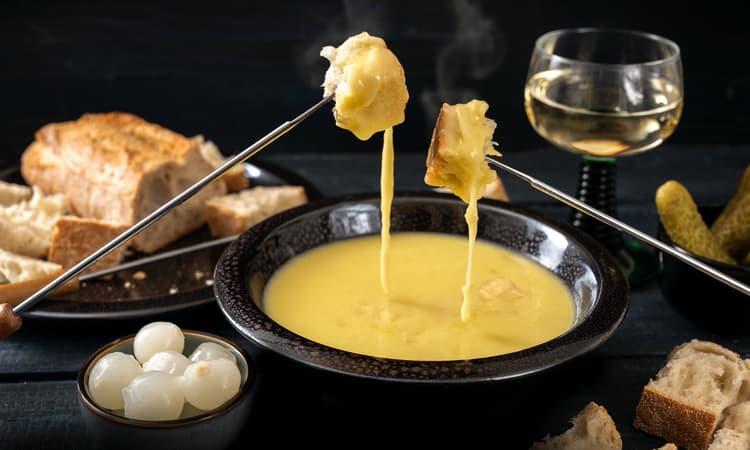 Cheese fondue in Switzerland: A guide to the cheesy Swiss classic