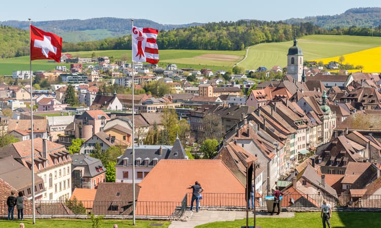 Why does Canton Jura celebrate Independence Day on June 23?