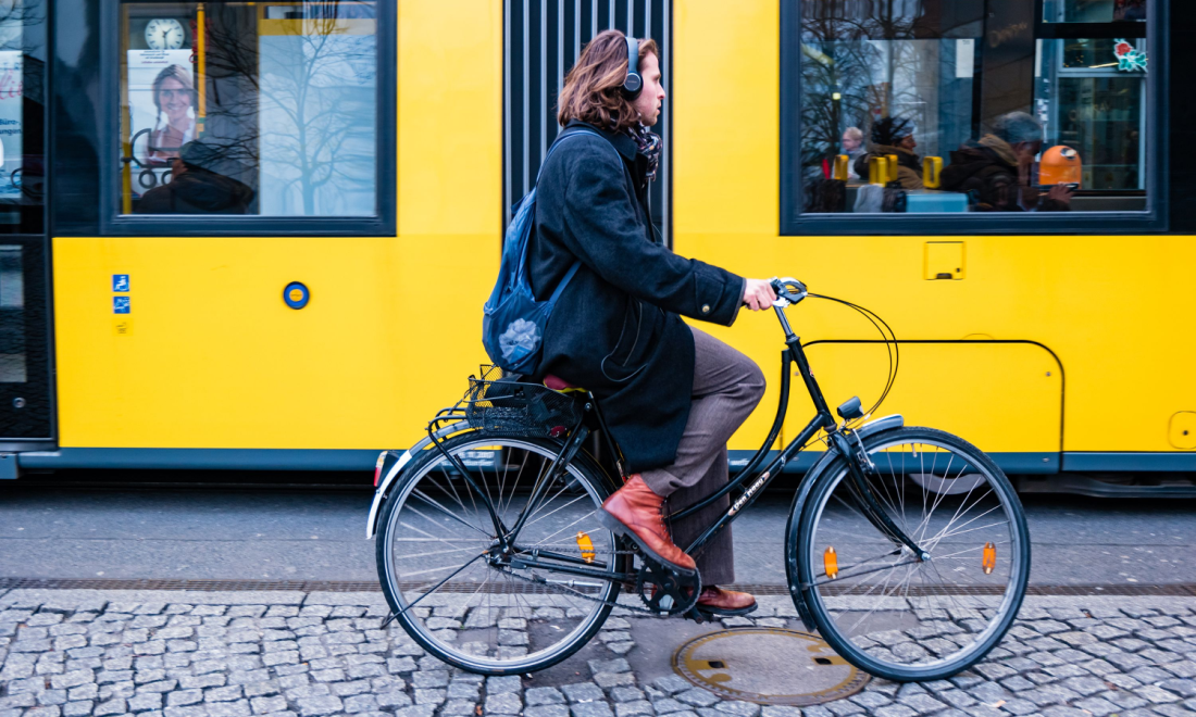 A university student riding a bike in Berlin