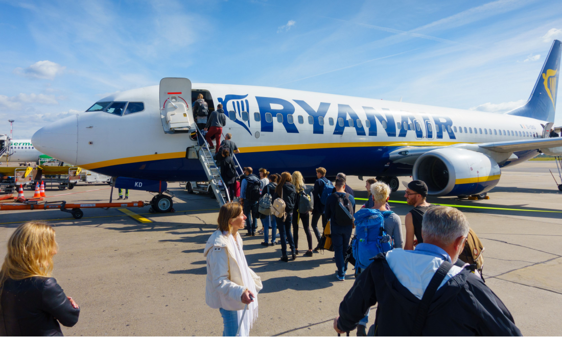 People boarding plane leaving German airport