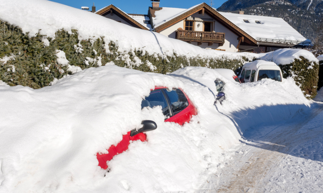 Car buried after snowstorm in Germany