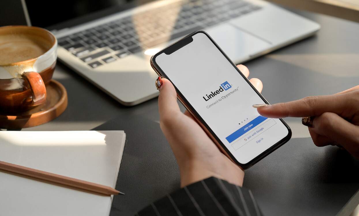 woman using linkedin on phone recruiters