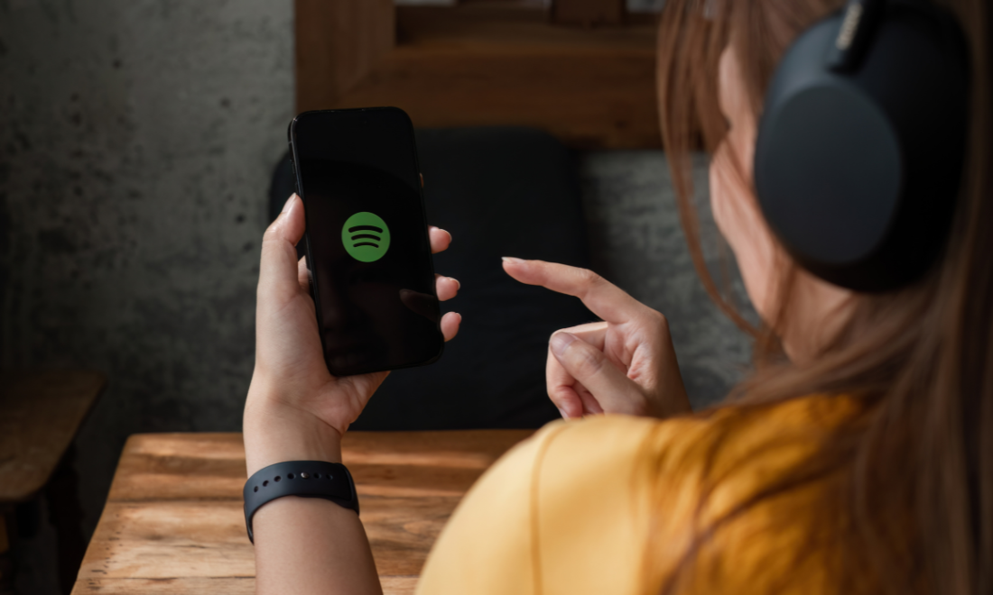 Woman listening to music on Spotify